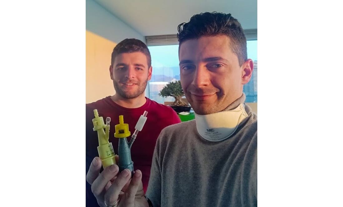 Los ingenieros Alessandro Romaioli y Christian Fracassi son los ingenieros que imprimieron las válvulas Venturi para un hospital en Brescia. Foto: Handout / ISINNOVA / AFP