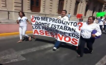 500 march in demand of justice for Cristopher Márquez