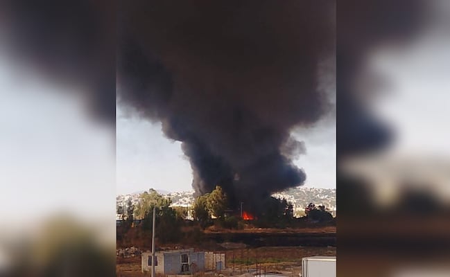 Se registra incendio en predio de Tultitlán donde almacenaban basura; llamas alcanzan varias casas de lámina sin que se reporten lesionados