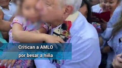 Critican a AMLO por besar a niña pese a recomendaciones por coronavirus