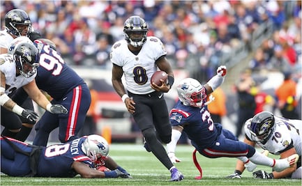 Lamar Jackson selló el triunfo de Baltimore en Nueva Inglaterra