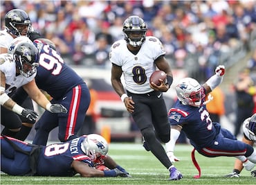 Lamar Jackson selló el triunfo de Baltimore en Nueva Inglaterra