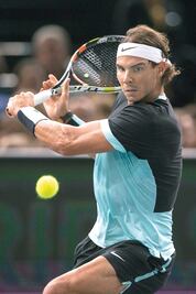 Favoritos avanzan sin problemas en París