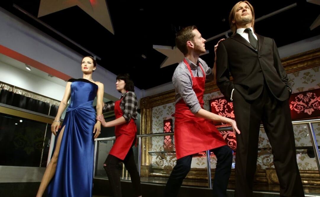 El Museo Madame Tussauds de Londres separó ayer las figuras de cera de las estrellas hollywoodenses  FOTO: XINHUA