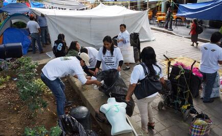 Comerciantes limpian el centro histórico de Oaxaca