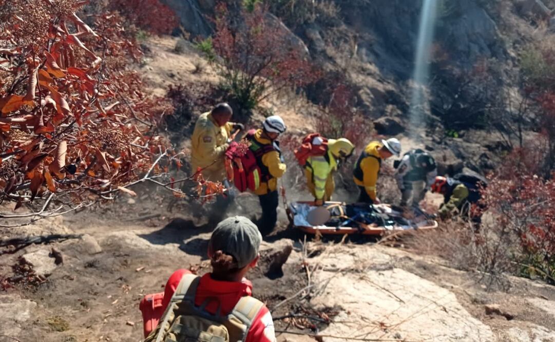 Elementos de Grupo Beta Tecate auxiliaron a 11 personas mexicanas que lograron salir del Cerro de Cuchumá tras ser atacados con armas de fuego. Foto: INM