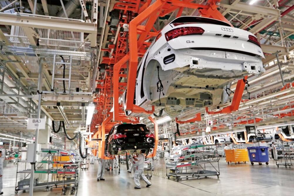Según DuPont, las plantas automotrices que abrieron este año, como Audi en Puebla o KIA en Nuevo León, van a potencializar la producción de autopartes (ARCHIVO EL UNIVERSAL)