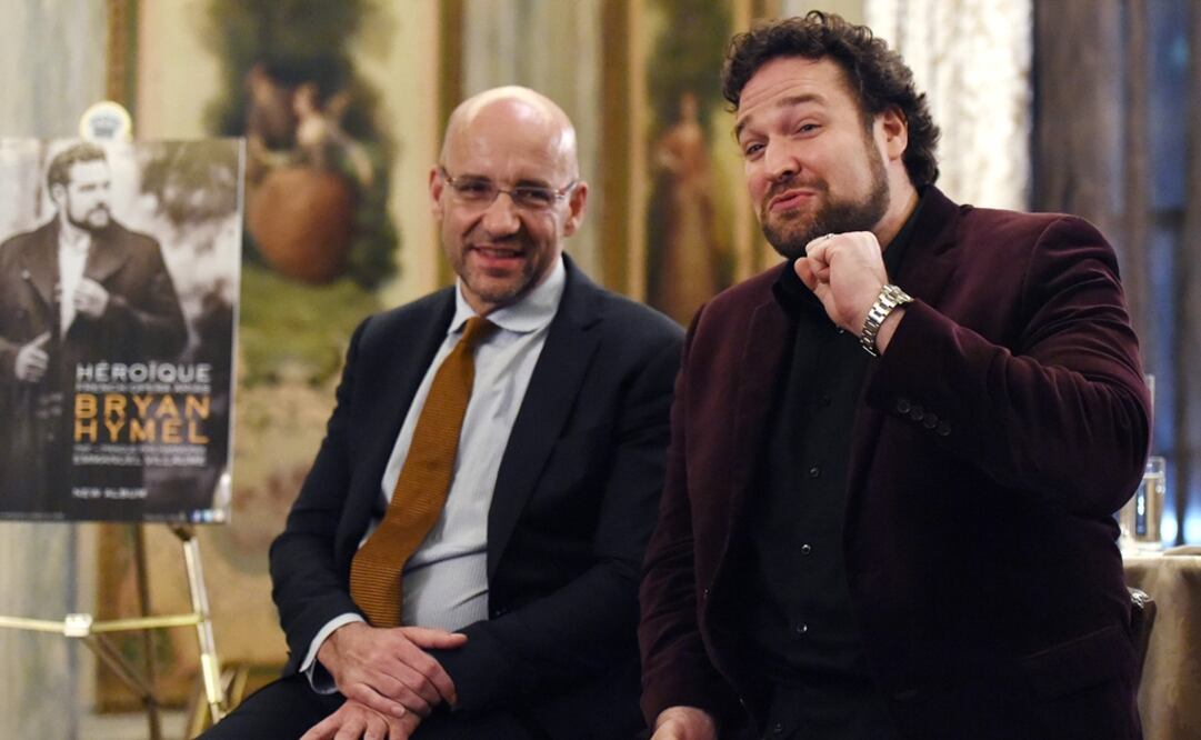 Fotografía del director de orquesta Emmanuel Villaume (izq) y del tenor Bryan Hymel (der). Foto: AFP / Don Emmert, Archivo