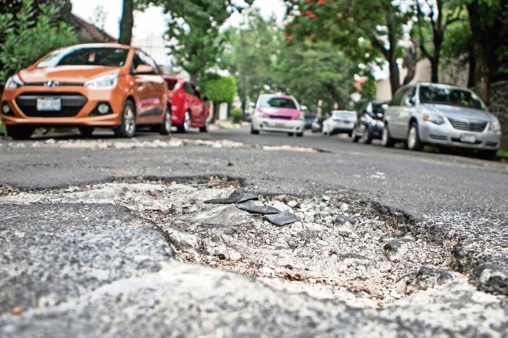 Hasta el 4 de agosto, la Sobse reportaba 243 reportes de baches que estaban en la categoría de “pendiente de solución” (ARCHIVO EL UNIVERSAL)