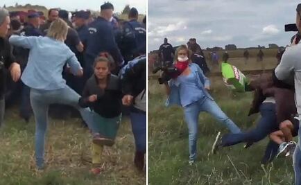 Video. Reportera húngara patea a refugiados