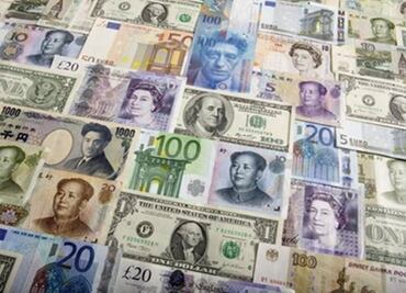 Dollar gains against commodity currencies on oil weakness