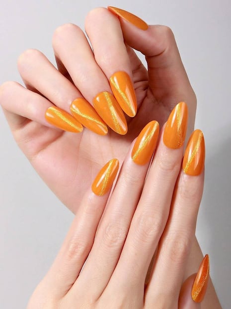 Uñas Aperol ojo de gato. Foto: Shein