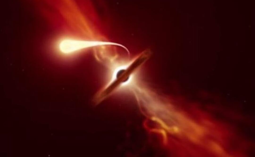 La ilustración muestra una estrella (en primer plano) que experimenta una espaguetización al ser succionada por un agujero negro supermasivo. Foto: Vía ESO/M. KORNMESSER: 