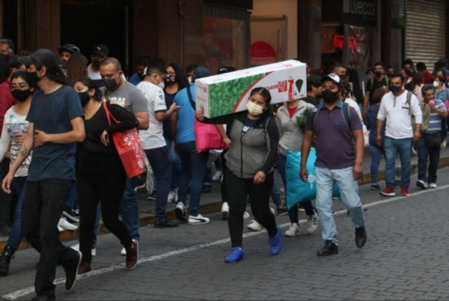 Inundaciones, baile callejero y compras navideñas, entre las fotos de la semana