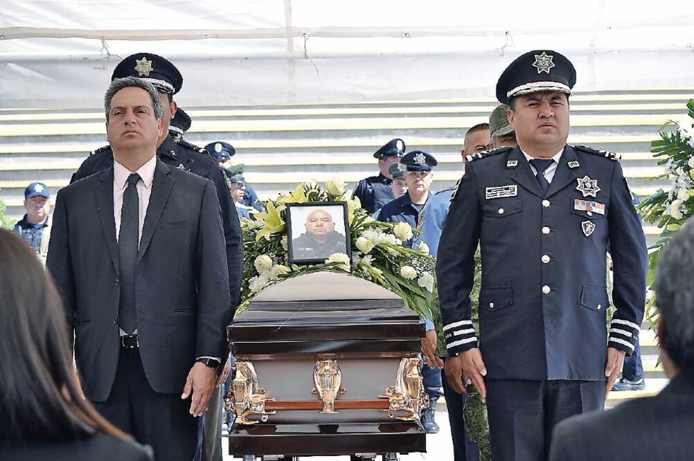 En el funeral, el fiscal estatal César Peniche dijo que fue un ataque cobarde el que se cometió contra los agentes, a principios de abril. (FISCALÍA DE CHIHUAHUA)