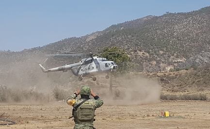 Duplican personal y equipo aéreo para combatir incendio forestal en la sierra de Santiago, NL