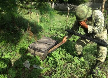 Hallan 4 cuerpos en Oaxaca; uno de una mujer enmaletada