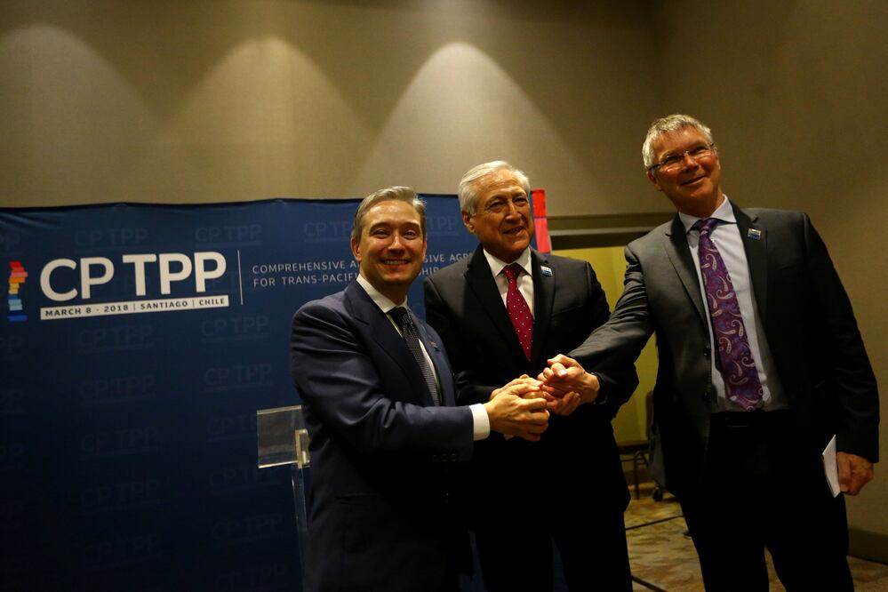 El ministro de Relaciones Exteriores de Chile, Heraldo Muñoz (C), acompañado por el ministro de Comercio de Canadá, François-Philippe (i) y el ministro de Comercio de Nueva Zelanda, David Parker (d). Foto: Reuters