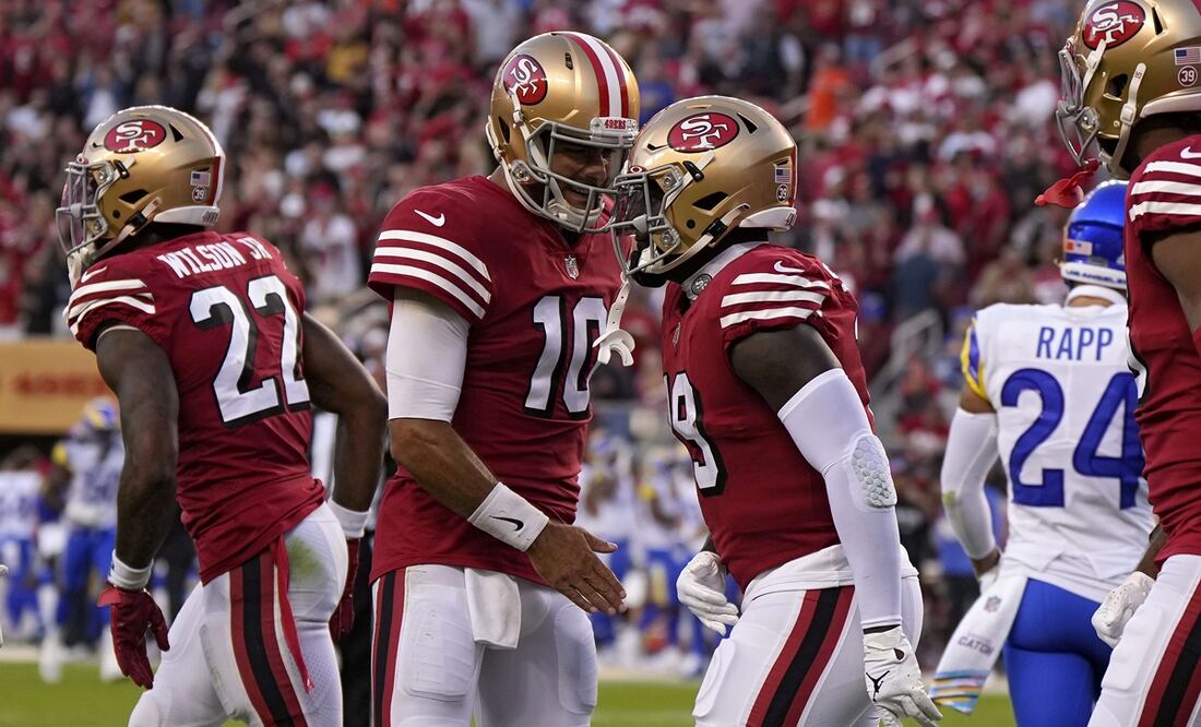 Jimmy Garoppolo con Deebo Samuel - FOTO: AFP