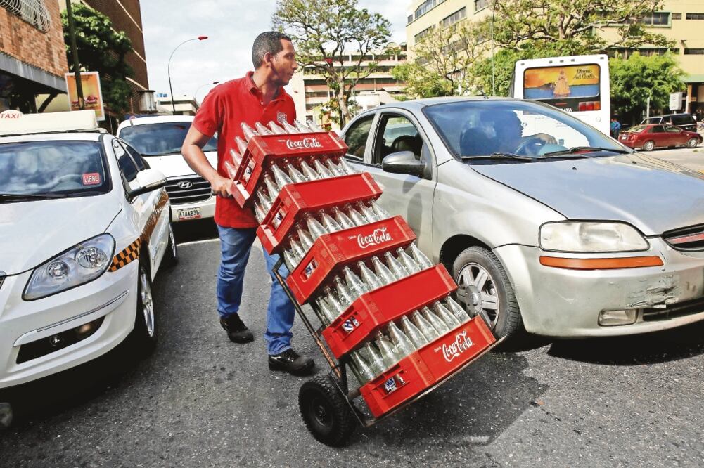 Dificultades. Coca-Cola FEMSA enfrenta en Venezuela condiciones económicas adversas que impactan en sus ingresos (ARCHIVO. EL UNIVERSAL)