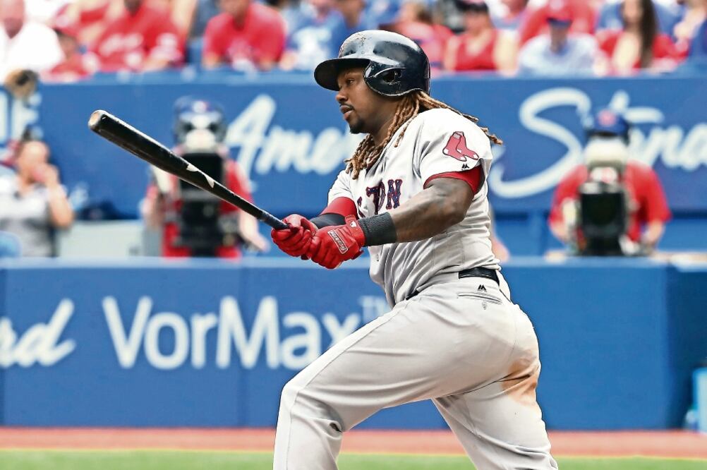 El dominicano Hanley Ramirez brilló en la ofensiva de Boston (TOM SZCZERBOWSKI. AFP)