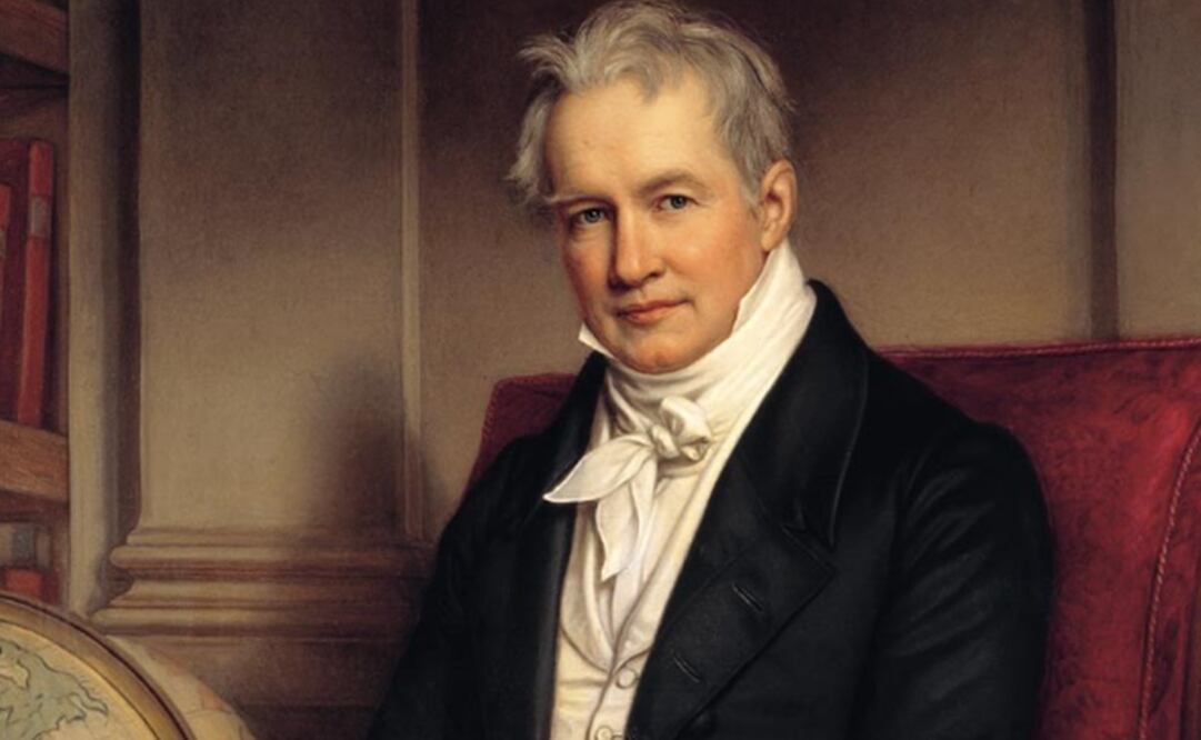 Alexander von Humboldt sentado junto a un globo terráqueo con un manuscrito de la obra de su vida "Cosmos: un boceto de una descripción física del universo".Foto: Collection Charlottenhof Palace.