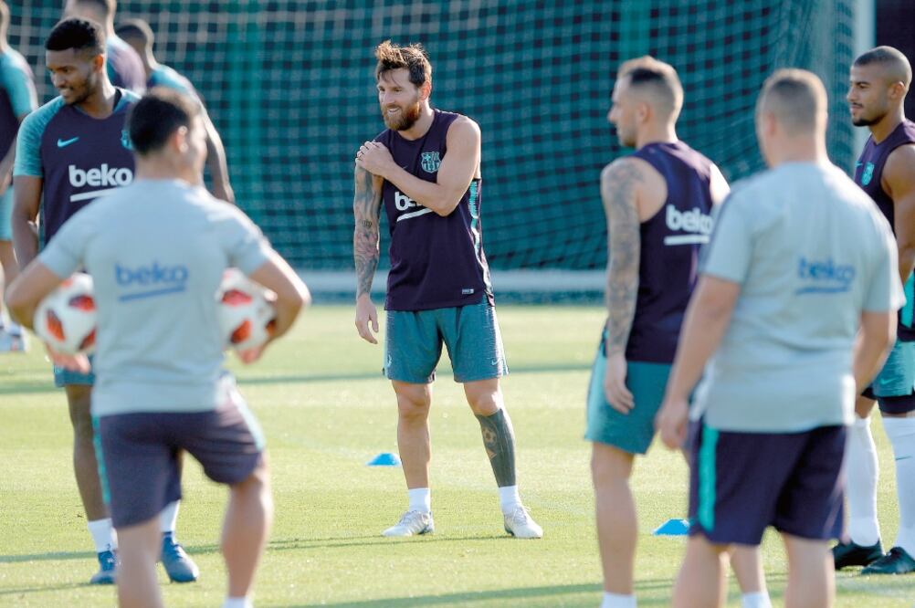 Leo entrenó para hacerle los honores a los sevillanos (JOSEP LAGO. AFP)
