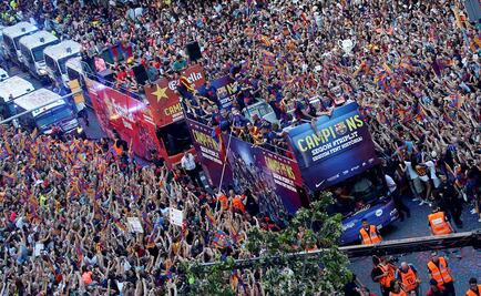 Miles de hinchas celebran triplete Barcelona