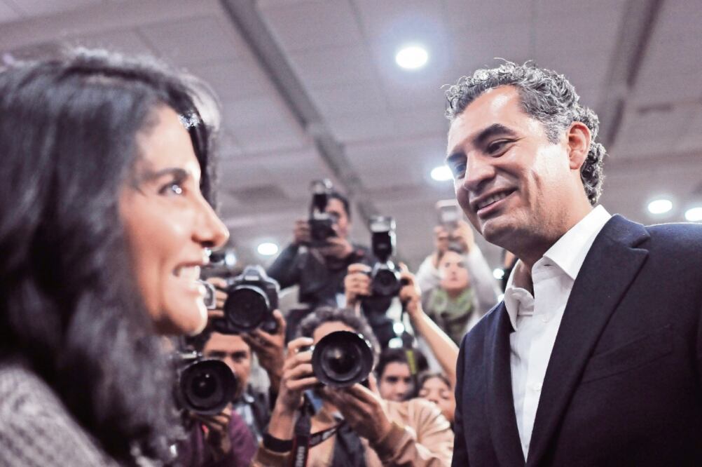 La presidenta nacional del PRD, Alejandra Barrales, y el dirigente nacional del PRI, Enrique Ochoa Reza, en la 58 Semana Nacional de Radio y Televisión (CUA RTOSCURO)