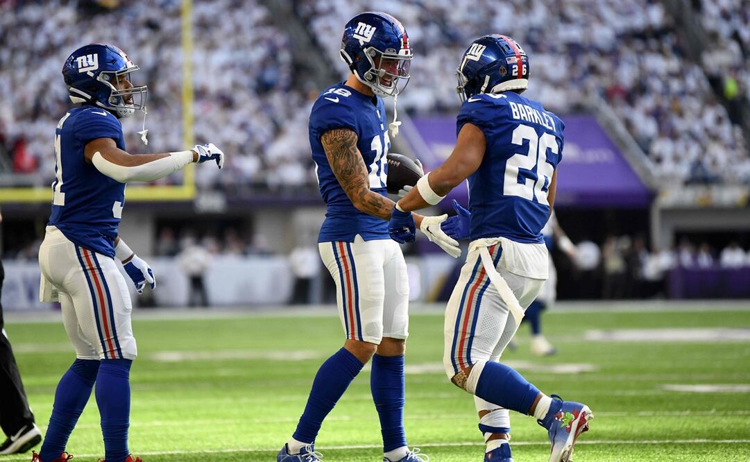 Isaiah Hodgins celebrando tras hacer un touchdown para los Giants - FOTO: AFP