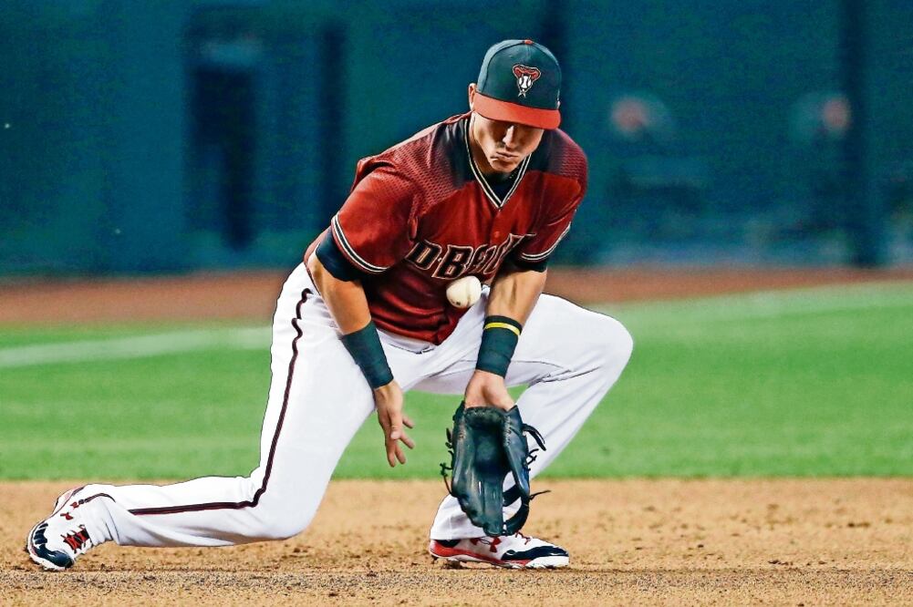 Jake Lamb conectó su segundo jonrón como zurdo de 2017. (ROSS D. FRANKLIN. AP)