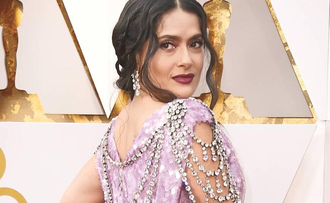 La actriz portó ayer un vestido lila de Gucci con lentejuelas (NEILSON BARNARD. AFP)