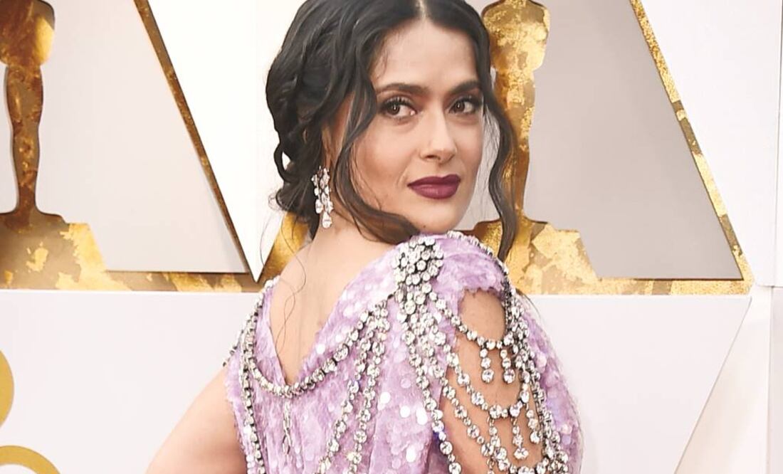 La actriz portó ayer un vestido lila de Gucci con lentejuelas (NEILSON BARNARD. AFP)