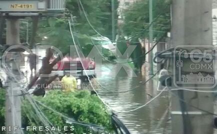 Periférico amanece inundado tras lluvias de anoche