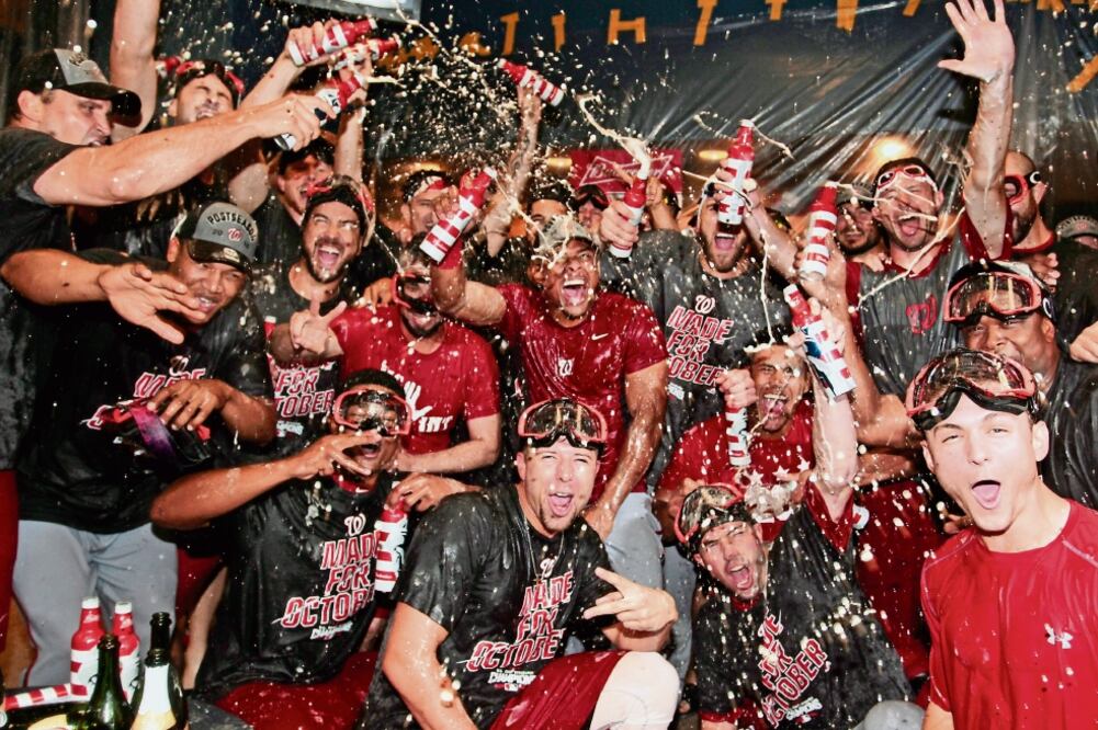 Washington puso a enfriar la champaña antes del juego para festejar (CHARLES LECLAIRE. USA TODAY SPORTS)