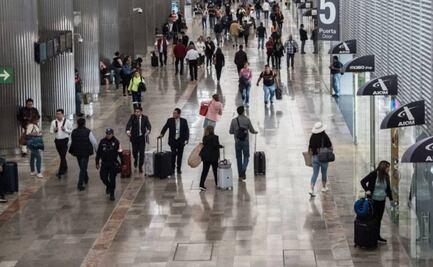 Detienen a dos hombres por asaltar a usuarios del AICM