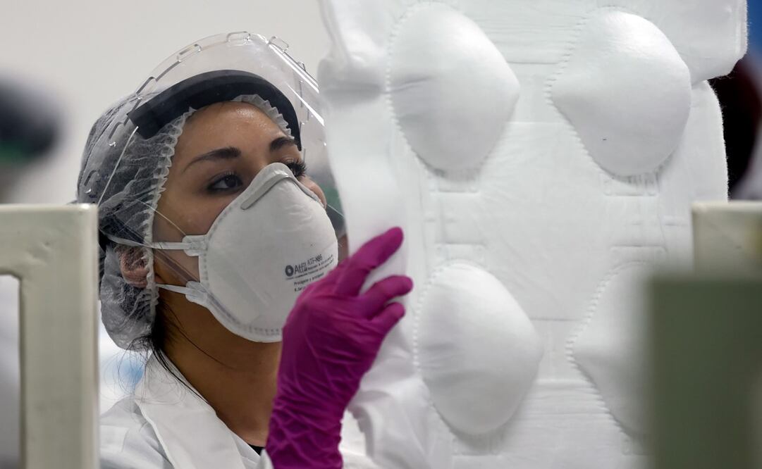 La OMS recomienda el uso de mascarillas y cubrebocas para evitar la propagación del Covid-19. Foto: Alfredo Estrella/AFP