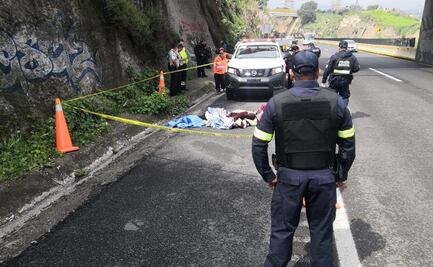 Hallan cuerpo de mujer enconbijado en la carretera Chamapa-Lechería