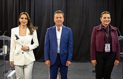 Candidatos intercambian acusaciones en debate