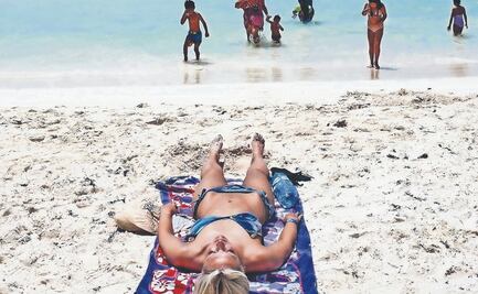 Vacacionan en México menos turistas de EU y Canadá