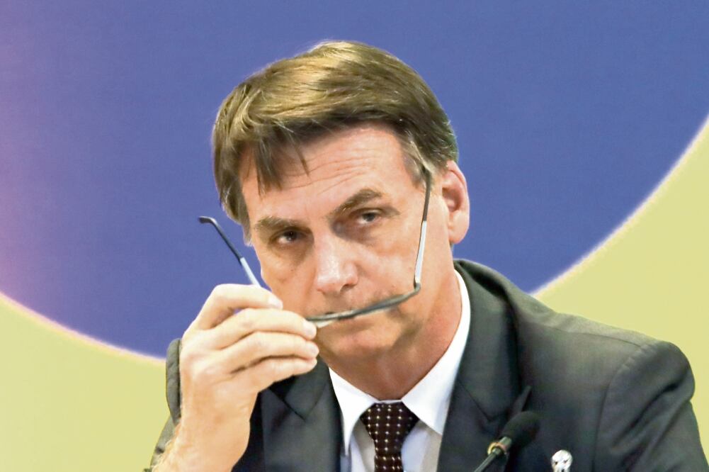 Las acusaciones contra Flávio Bolsonaro, hijo de Jair Bolsonaro, han empañado los preparativos de la toma de posesión. (ARCHIVO. AFP)