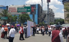Boleteros de la Lotería Nacional bloquean Paseo de la Reforma; acuerdan mesa de diálogo con autoridades