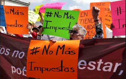 FOTOS: Comerciantes protestan contra el aumento de impuestos a refrescos y cigarros