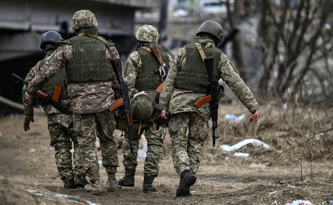 Rusia entrega cuerpos de prisioneros de guerra a Ucrania. Foto: Aris Messinis/AFP