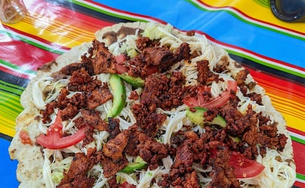 El ingrediente secreto que le da sabor al asiento de las tlayudas