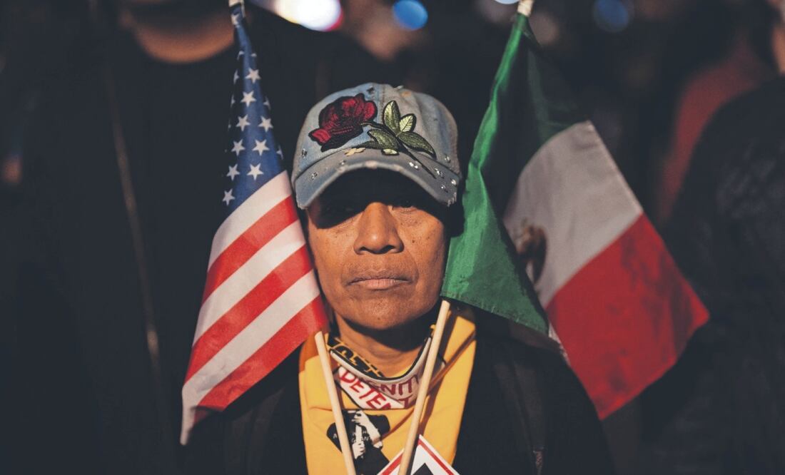 Asistente a una manifestación contra los arrestos realizados por el Servicio de Inmigración y Control de Aduanas (ICE) en la ciudad de Nueva York, el 22 de octubre pasado. Foto: AFP