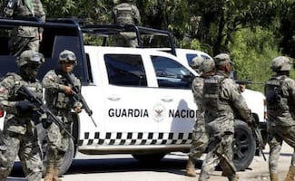 Detienen a dos hombres armados en Mérida, Yucatán; les aseguran 12 mdp
