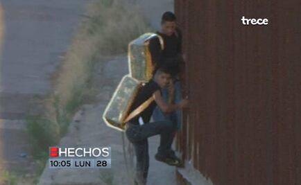 Suspected smugglers caught on video scaling U.S. border fence