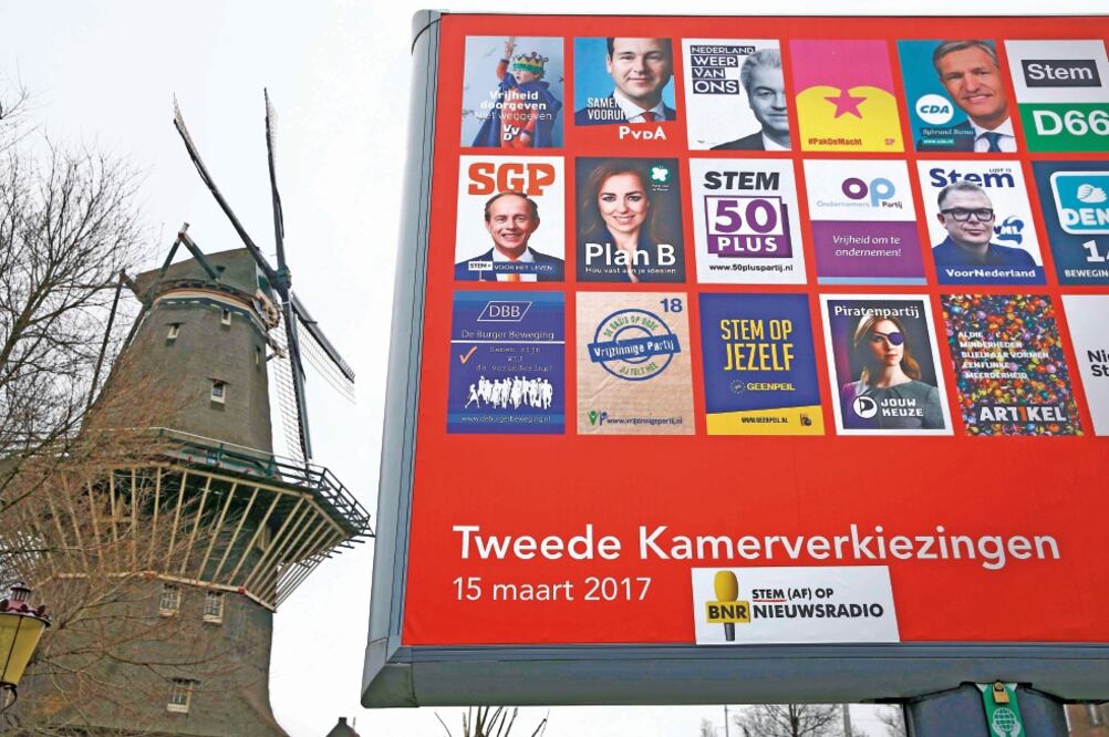 Candidatos de cinco partidos participan hoy en las elecciones legislativas de Holanda, en las que 13 millones de personas decidirán qué partido encabezará el nuevo gobierno (MICHAEL KOOREN. REUTERS)