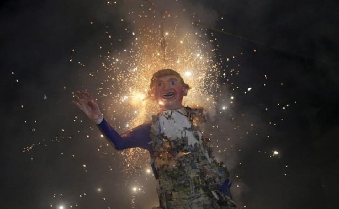 In Mexico City's La Merced neighborhood, hundreds of cheering residents yelled "death" and various insults as they watched the explosion of the grinning papier-mâché mock-up of the real estate tycoon. (Photo: Reuters)